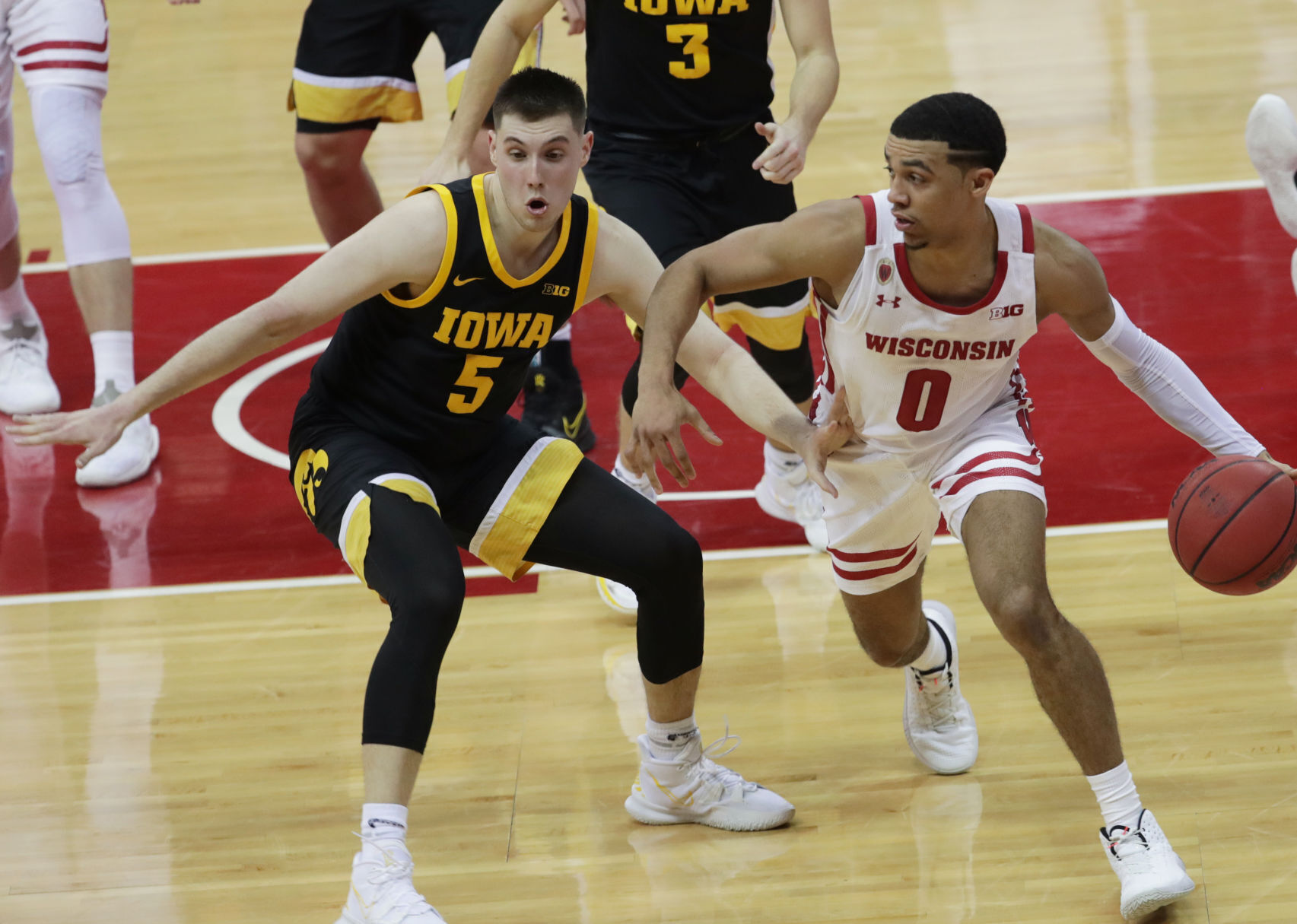 Iowa 77, UW 62